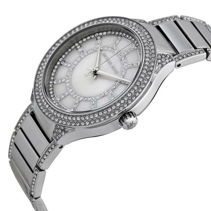 Michael Kors Kerry MK3311 angled view showing mother-of-pearl dial and crystal bezel detail