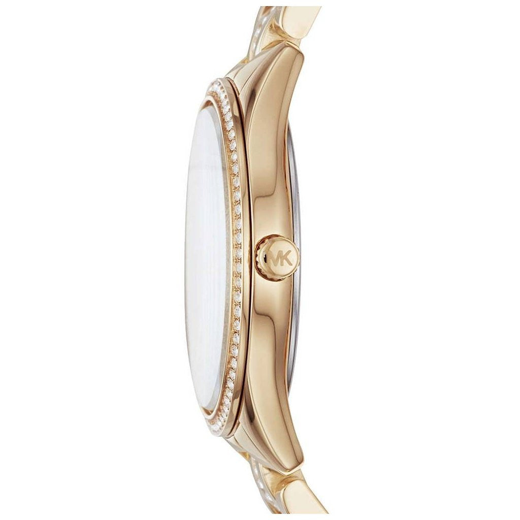 Side view of Michael Kors Lauryn gold watch showing thin profile and crystal-adorned bezel