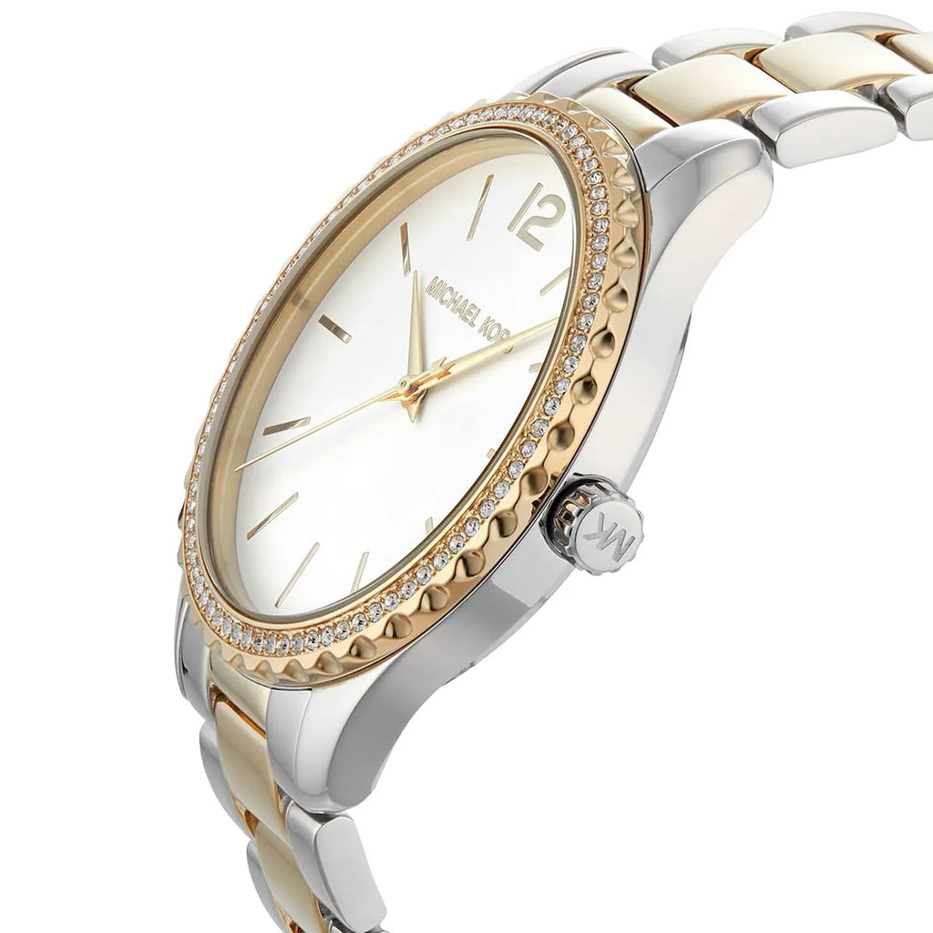 Michael Kors Layton watch on wrist, silver dial with gold hour markers and two-tone bracelet