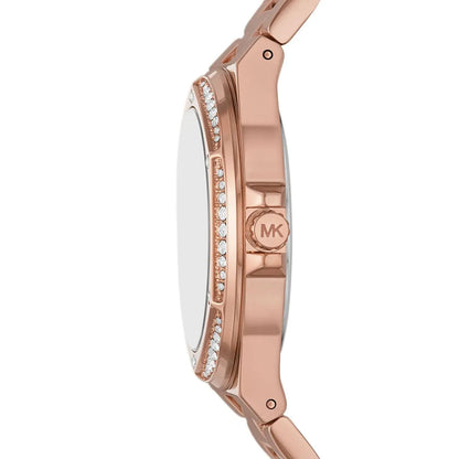 Michael Kors Lennox rose gold-tone watch side profile showing crystal-set bezel and steel bracelet
