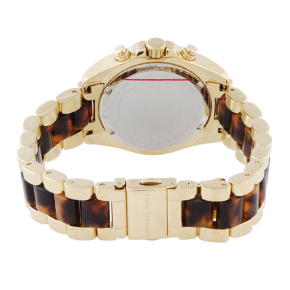 Michael Kors Mini Bradshaw watch caseback showing tortoise and gold two-tone bracelet detail