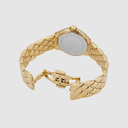 Michael Kors Mini Camille MK4801 caseback showing stainless steel back and gold-tone quilted bracelet