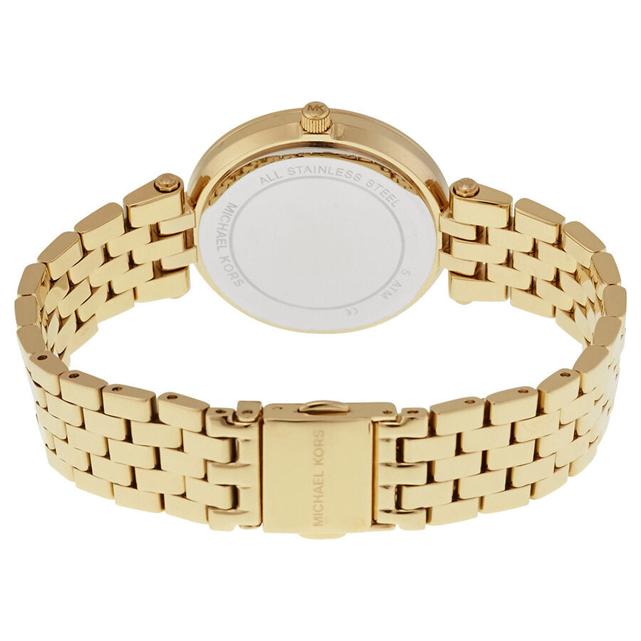Caseback view of Michael Kors Mini Darci watch with gold bracelet