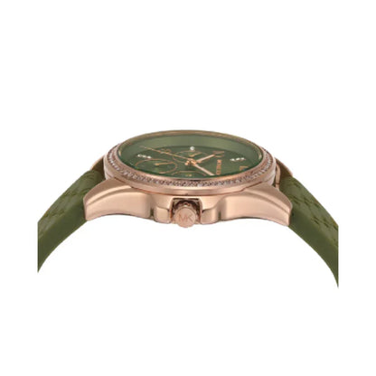 Michael Kors Mini Pilot watch side profile showing rose gold case and green silicone strap