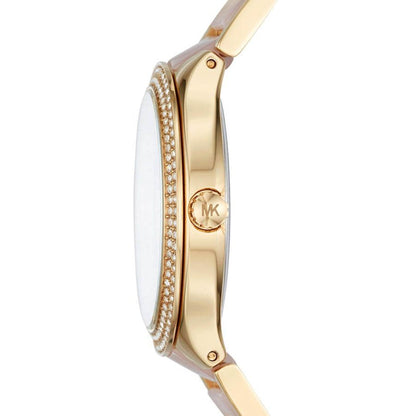 Michael Kors Kerry MK3508 side view showing gold-tone case, pink acetate strap, and crystal bezel