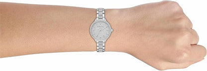 Michael Kors Slim Runway pavé silver-tone watch on woman's wrist