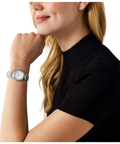 Michael Kors MK4824 Mini Sage watch worn on wrist with white dial and silver strap