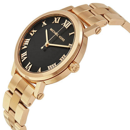 Michael Kors Norie watch angle view showing black dial, rose gold-tone case and linked bracelet