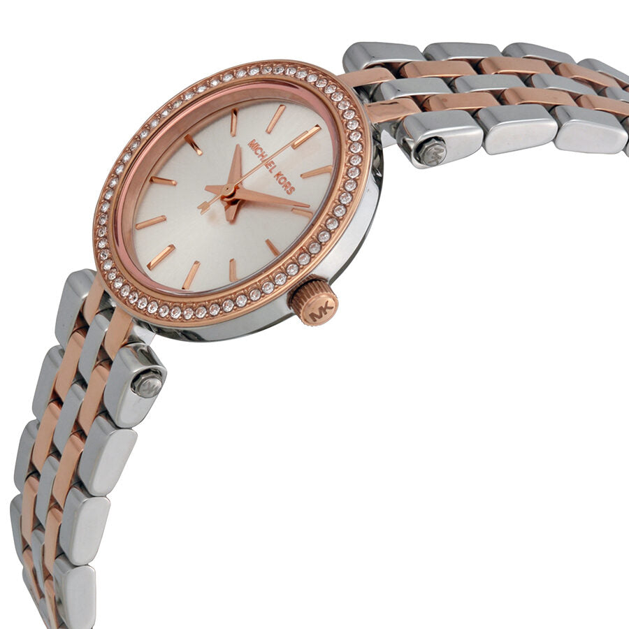 Michael Kors Petite Darci watch at angle showing rose gold and silver bracelet