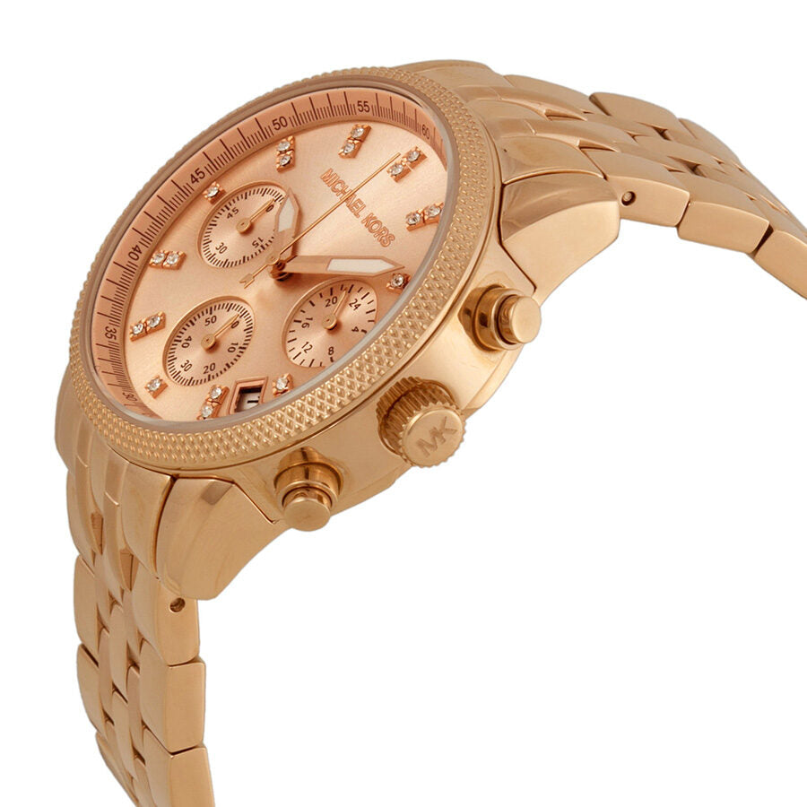 Michael Kors Ritz MK6077 rose gold chronograph watch shown from side angle with chronograph pushers