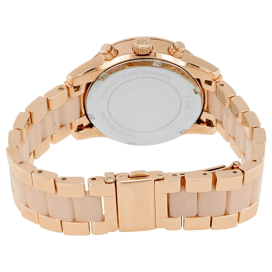 Michael Kors Ritz MK6307 watch caseback showing rose gold stainless steel construction