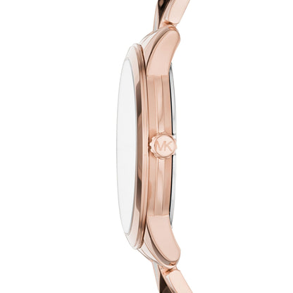 Side profile view of Michael Kors Runway Mercer watch showing rose gold case and stud bracelet