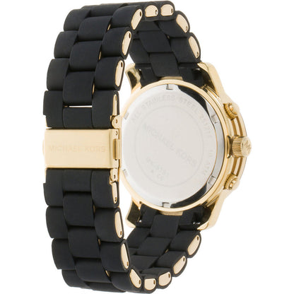 Caseback of Michael Kors Runway MK5191 watch showing black rubber strap with gold hardware