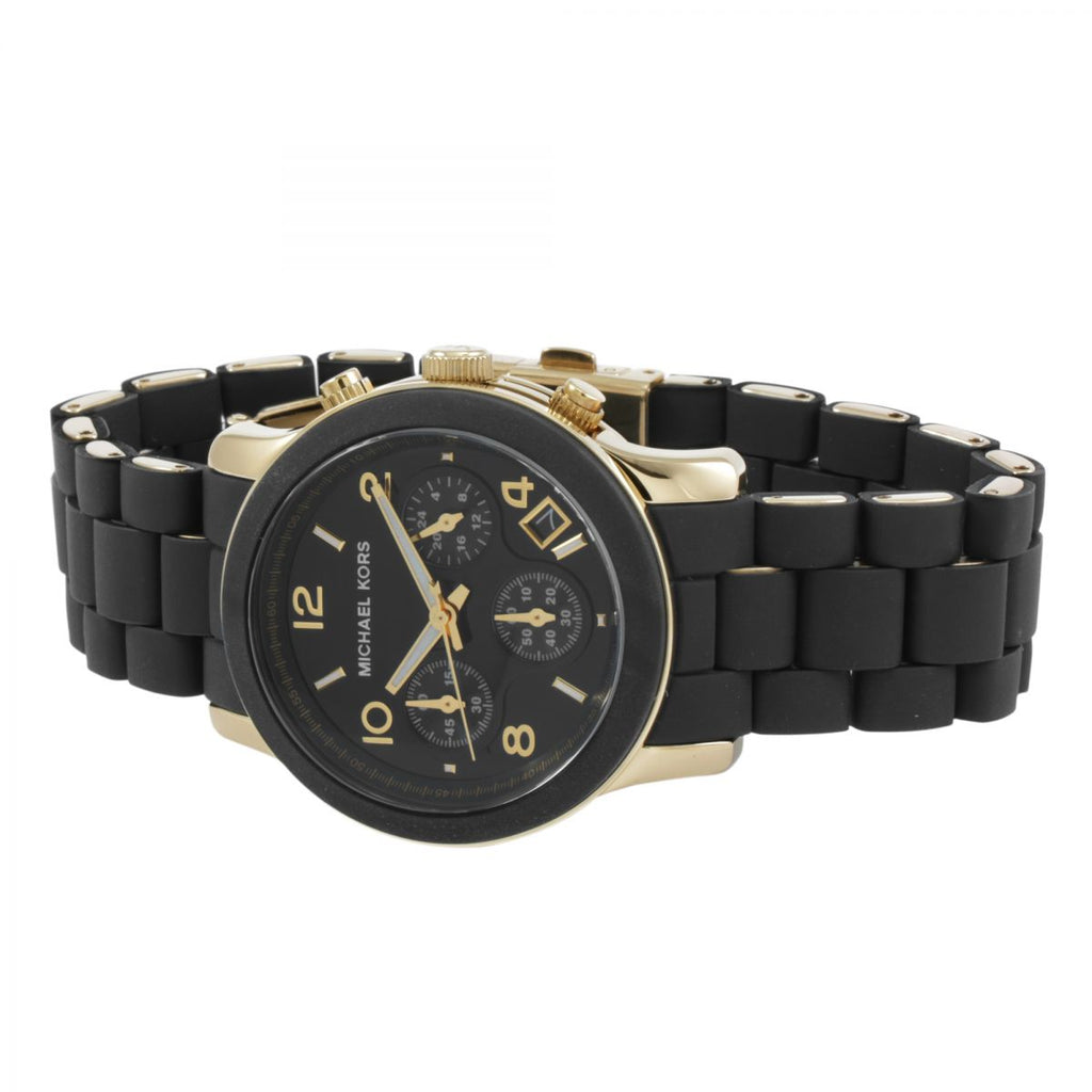 Michael Kors Runway MK5191 chronograph watch on wrist with black and gold rubber strap