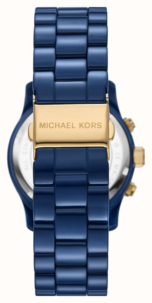 Michael Kors Runway MK7332 watch caseback view showing navy bracelet and gold-tone deployment clasp