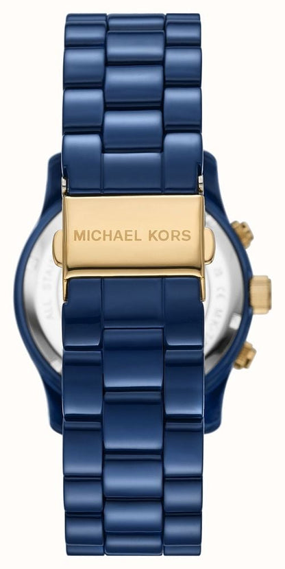 Michael Kors Runway MK7332 watch caseback view showing navy bracelet and gold-tone deployment clasp