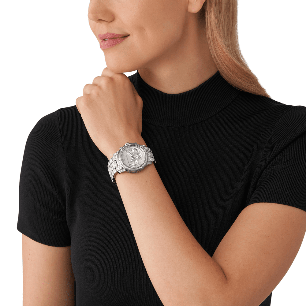 Michael Kors Runway MK7434 silver chronograph watch worn on wrist