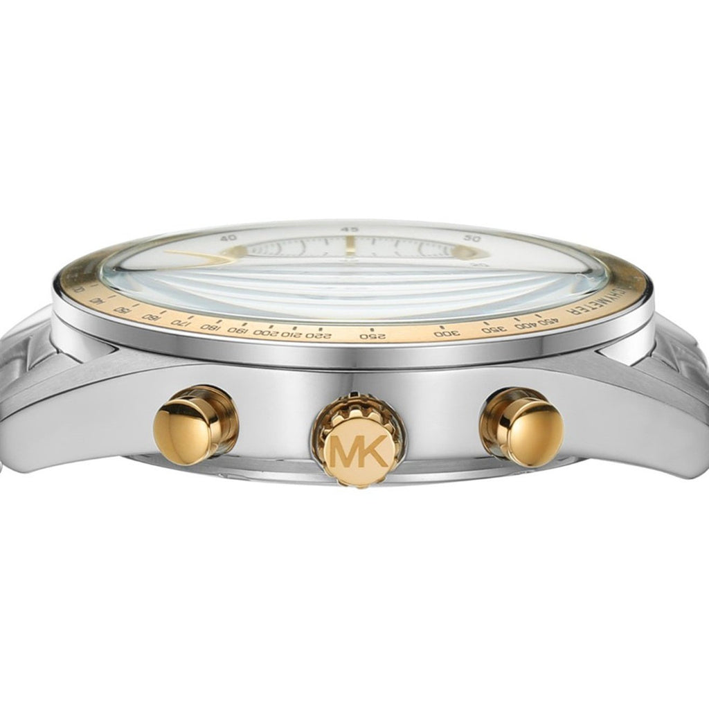 Michael Kors Warren chronograph watch showing side profile with silver case and gold-tone pushers