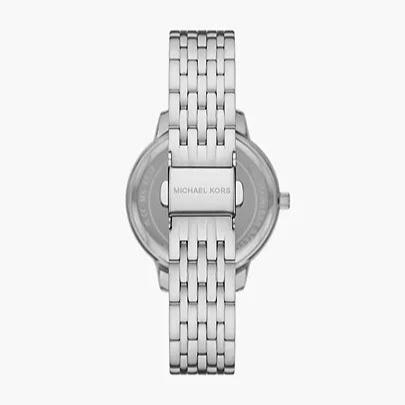 Michael Kors St. Moritz watch case back showing brand marking and link bracelet