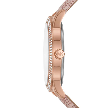 Side view of Michael Kors Tibby watch showing rose-gold case profile with crystal bezel and pink strap