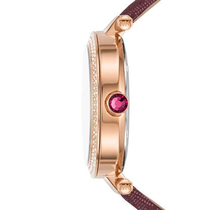 MK2974 side profile showing rose gold case thickness, crystal bezel, and merlot strap