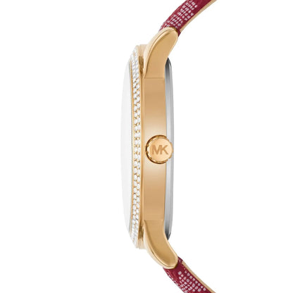 Side profile of Michael Kors Tibby watch showing crystal-set bezel, gold case, and red strap detail