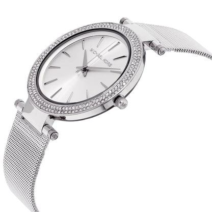 Michael Kors Darci watch at angle showing silver case and mesh strap
