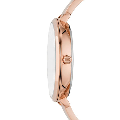Side view of Michael Kors Charley Pavé watch showing rose gold half-bangle strap and case profile