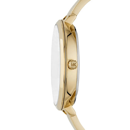 Side view of Michael Kors Charley watch showing gold-tone case and bracelet profile