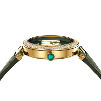Overhead view of Michael Kors Parker showing dial, gold case, green leather strap, and three-hand movement