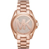 Michael Kors Bradshaw watch with rose gold dial featuring pavé crystal MK logo and matching rose gold bracelet