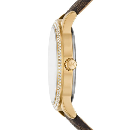 Michael Kors Tibby watch side view showing gold-tone case with crystal bezel and brown leather strap