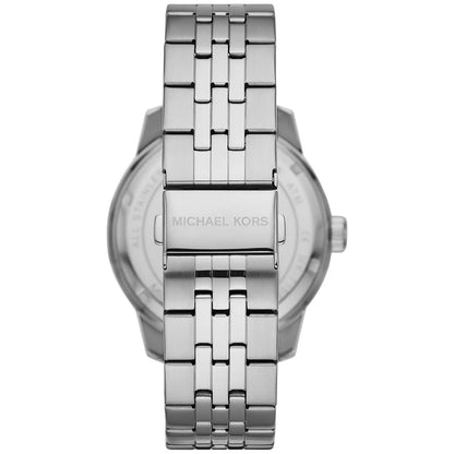 Case back of Michael Kors Cunningham watch showing silver stainless steel and Michael Kors branding
