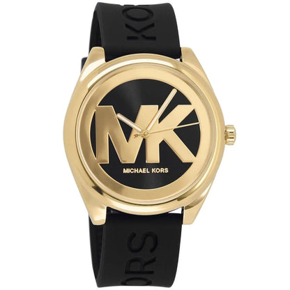 Michael Kors Janelle watch angled view showing gold-tone case and black silicone strap with MK branding