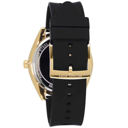 Michael Kors Janelle watch back showing black silicone strap with MK logo and gold-tone buckle