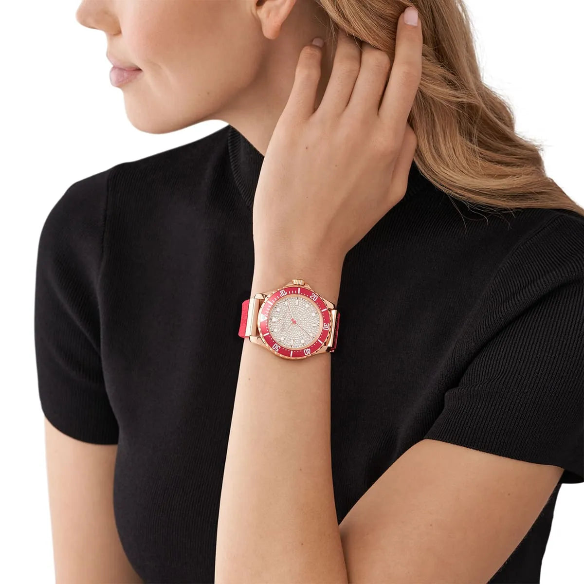 Michael Kors Everest watch worn on wrist showing crystal dial and pink strap styling