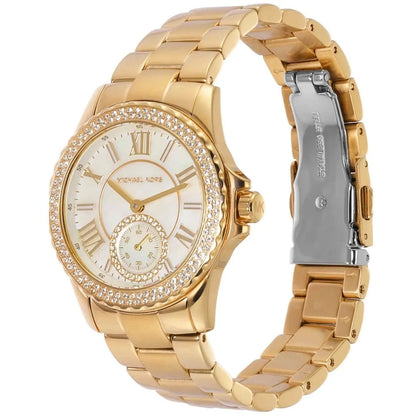 Three-quarter view of Michael Kors Mini Everest showing gold metal strap and crystal-set bezel