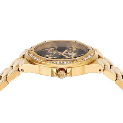 Overhead view of Michael Kors Lennox dial showing black face with MK logo pattern and crystal-paved bezel