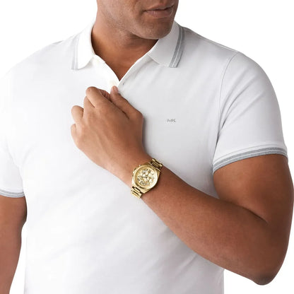 Michael Kors Brecken gold chronograph watch worn on wrist