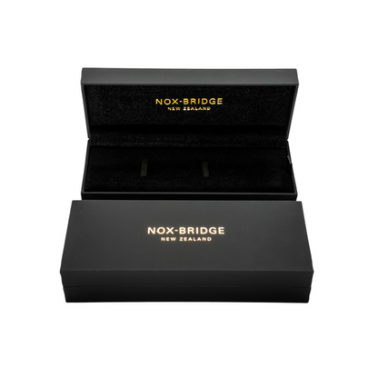 Noxbridge watch packaging with black presentation box and branded case