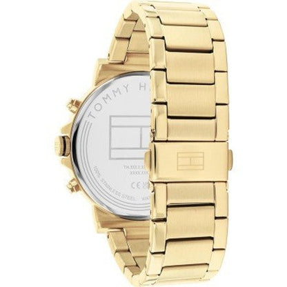 Back view of Tommy Hilfiger gold watch showing caseback and solid gold bracelet