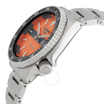 Side angle view of Seiko 5 Sports watch showing orange dial and stainless steel bracelet