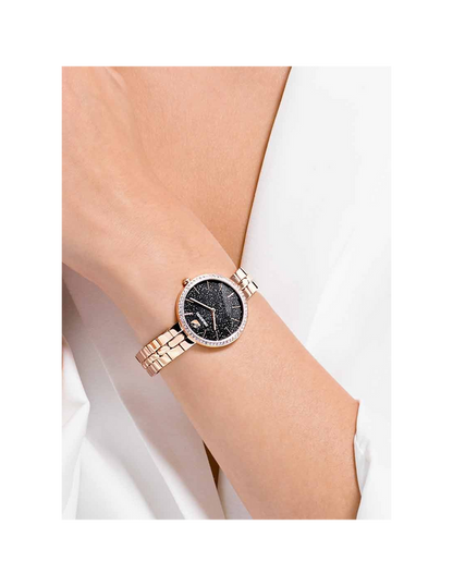Swarovski Crystal Pave women's watch worn on wrist, rose gold tone