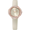 Swarovski Crystalline Aura women's watch with ivory dial and rose gold pavé bezel on cream strap
