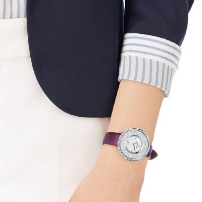Swarovski Eternal watch on wrist, crystalline dial with purple leather strap