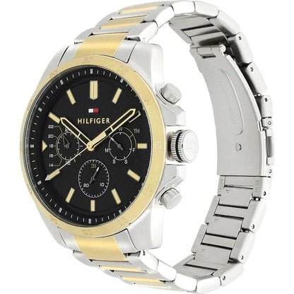 Tommy Hilfiger watch showing dual-tone steel and gold strap with gold bezel from side angle