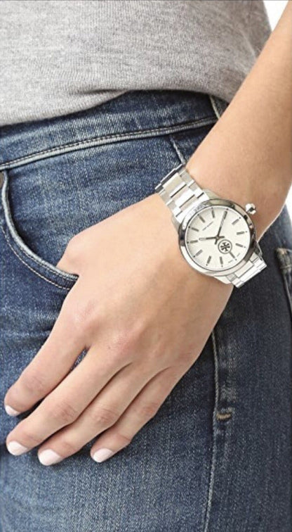 Tory Burch Collins women's watch on wrist with denim and neutral top