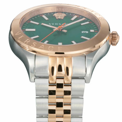 Close-up of Versace Hellenium dial showing green face with applied indices and rose gold crown