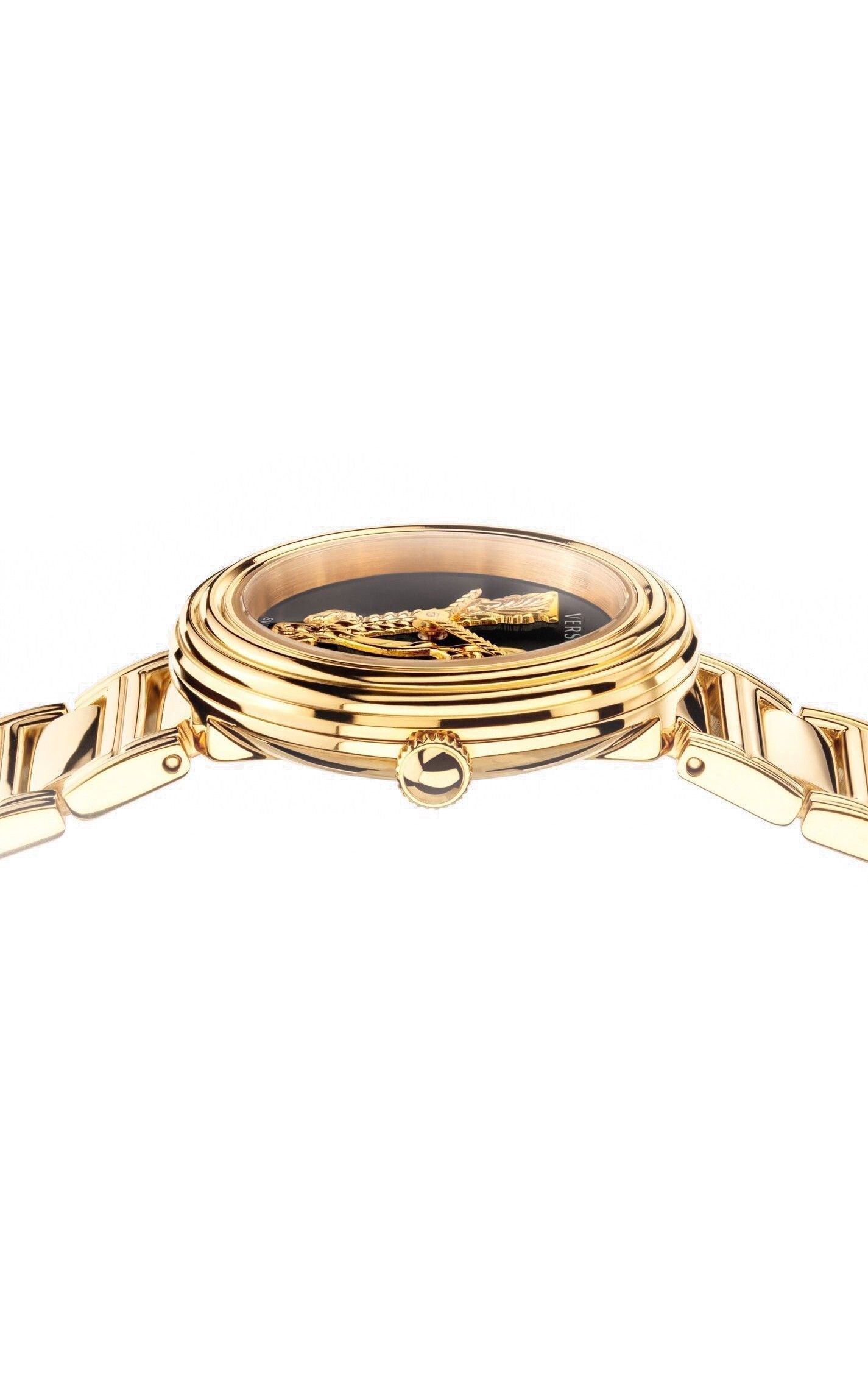 Dial detail showing Versace Medusa logo with gold bracelet lugs on gold case